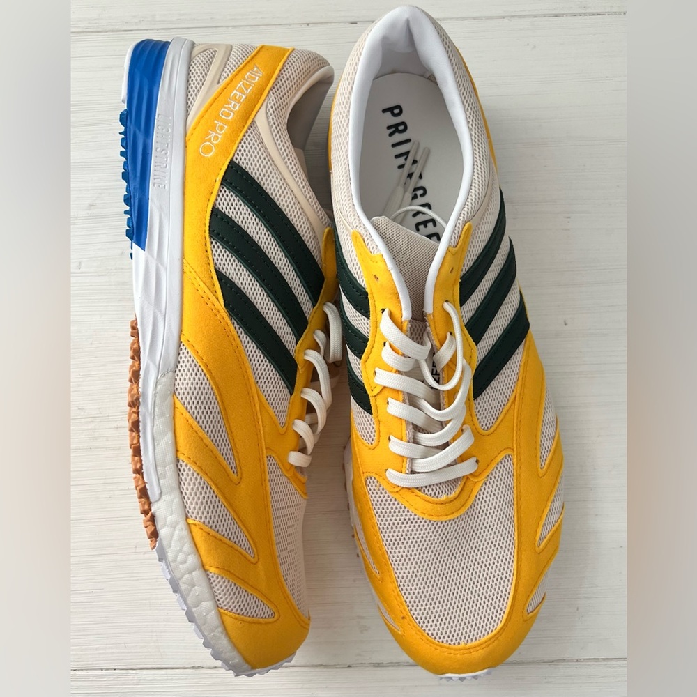 Adidas men’s running yellow sneakers